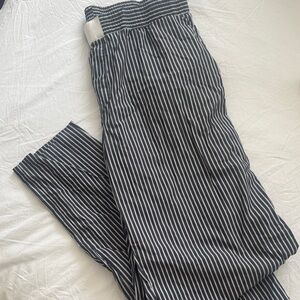 REVOLVE Lioness Cabin Pant in Onyx Stripe Black and White Striped Track Pants
